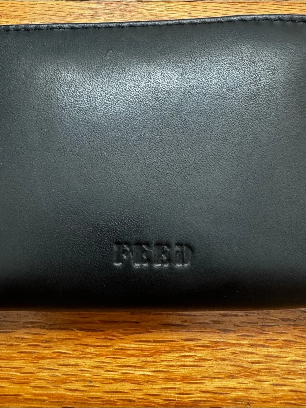 FEED projects black leather zip wallet